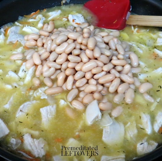 Creamy Tuscan White Bean and Chicken Soup- adding ingredients 