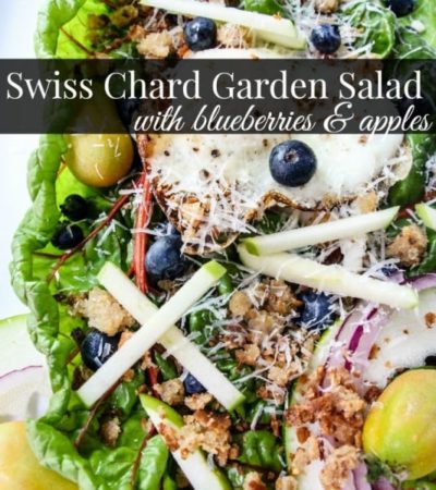 Swiss Chard Garden Salad- This garden salad is bursting with flavorful ingredients over a bed of swiss chard. It is a nutritious and simple salad to make.