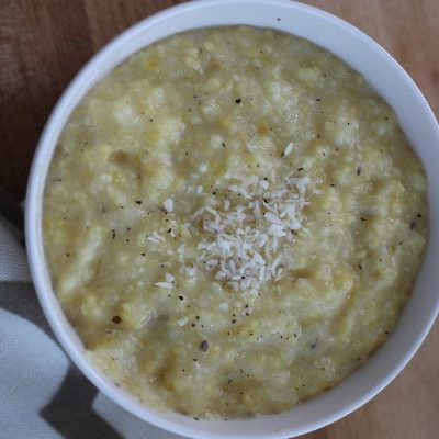 Easy Homemade Polenta- This creamy polenta recipe is inexpensive and easy to make. It is delicious served warm or sliced into patties for frying.