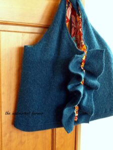 laptop bag made from wool sweater with ruffled detail