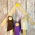 Clothespin nativity scene with a Popsicle stick stable