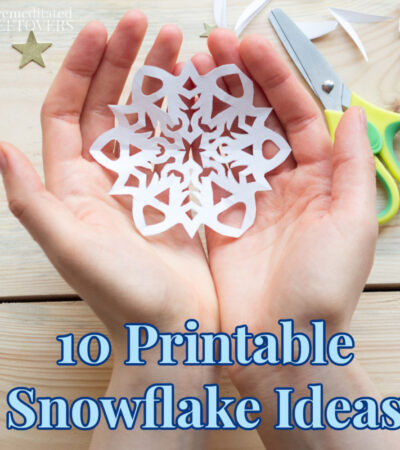 handmade paper snowflake in child's hands