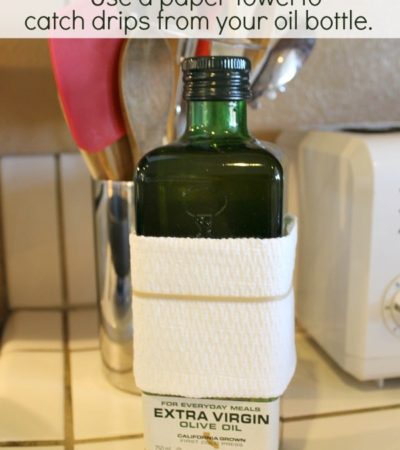 Use a paper towel around a oil bottle to catch drips