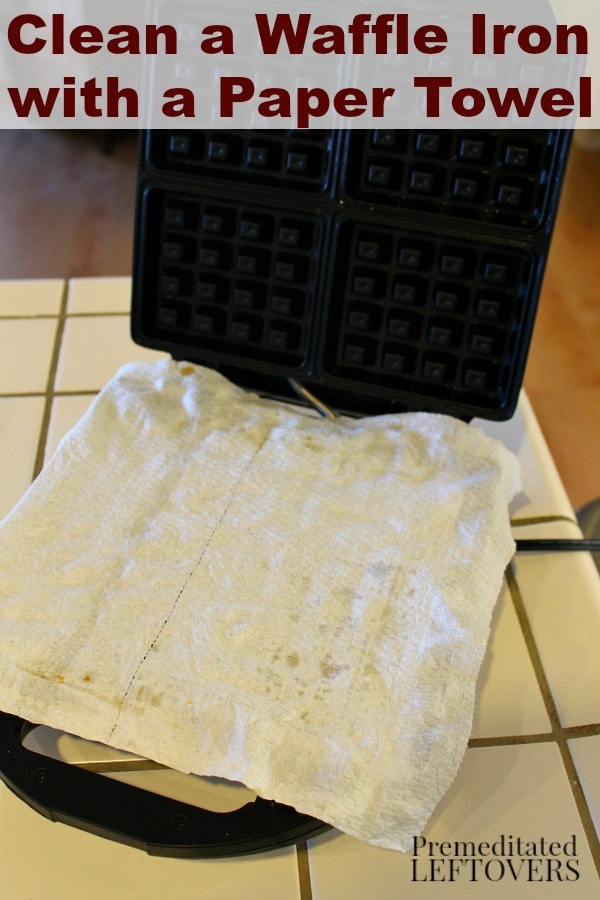 Use a paper towel to clean a waffle iron