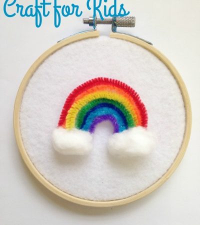 Easy Rainbow Wall Hanging Craft for Kids- This colorful wall hanging is simple to make with just a few materials. Kids will love creating their own rainbow!