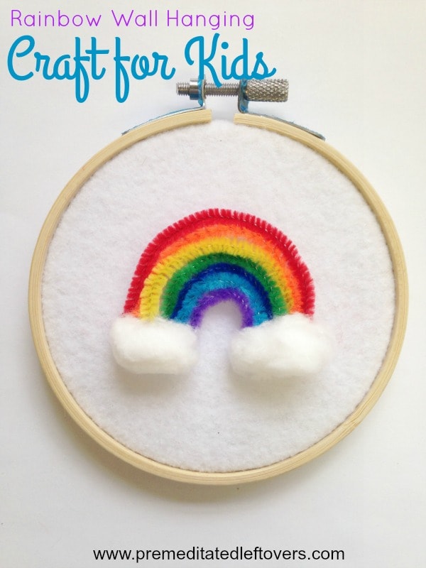 Easy Rainbow Wall Hanging Craft for Kids- This colorful wall hanging is easy to make with just a few materials. Kids will love creating their own rainbow!