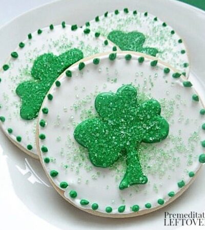 Colorful sugar cookies decorated with shamrocks for St. Patrick's Day.