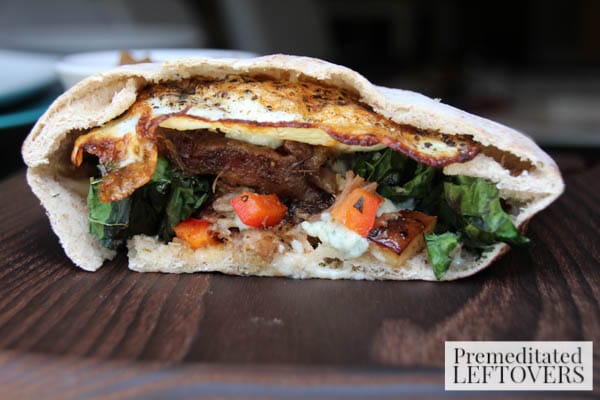 Pita Breakfast Sandwich- sandwich with eggs, steak, and veggies