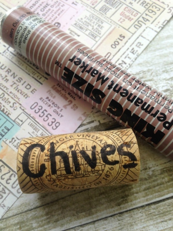 DIY Wire Wrapped Wine Cork Garden Markers- writing plant names on cork