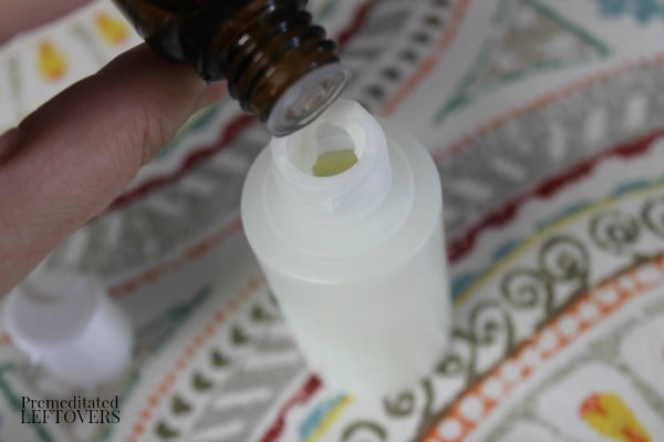 DIY After Sun Lotion with Essential Oils - adding oil to small bottle