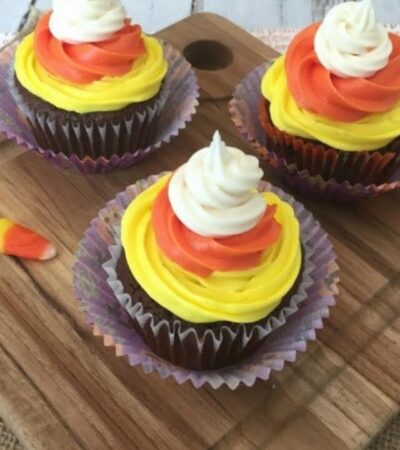 This easy Candy Corn Cupcakes recipe is perfect for Fall parties! These are delicious and easy to make! The frosting on the cupcakes resembles candy corn!