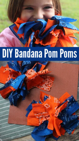 a girl holding homemade bandana pom poms