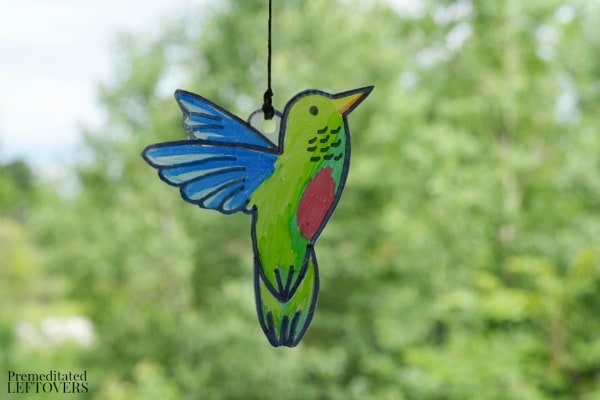 Hanging Hummingbird Sun Catcher- Create this colorful hummingbird sun catcher with your kids. It's a fun and frugal project to study birds or the letter H.