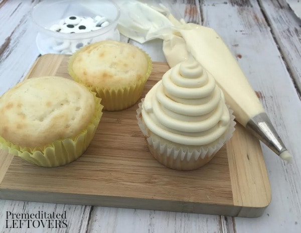 Vanilla Ghost Cupcakes-preparing to decorate