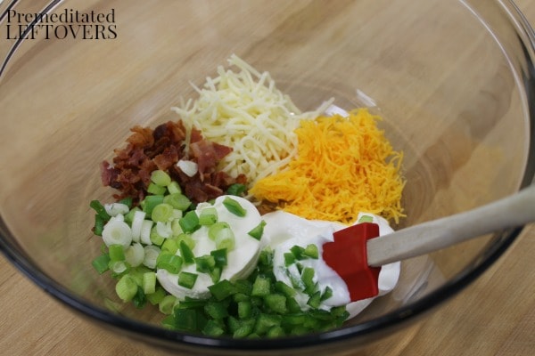 Mix the Jalapeno Popper dip mixture together for the Twice Baked Jalapneo Popper Spaghetti Squash Recipe