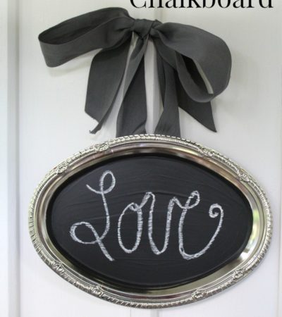 This Upcycled Serving Tray Chalkboard is a charming way to display messages in your home. It's also an easy DIY project that is quite inexpensive to make!