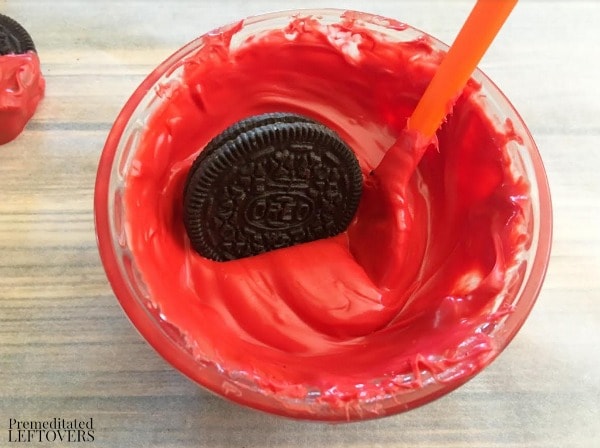 Mickey Mouse Chocolate Dipped Oreo Cookies- dip Oreos in melted red chocolate