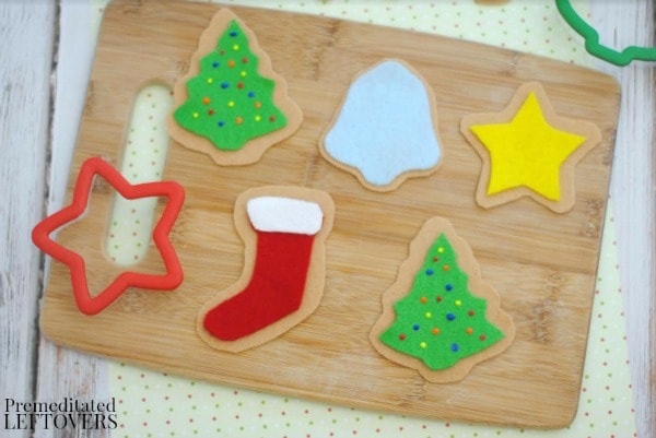 These Felt Christmas Cookies are an adorable craft for pretend play or to hang on your Christmas tree. Kids will enjoy decorating each colorful cookie!