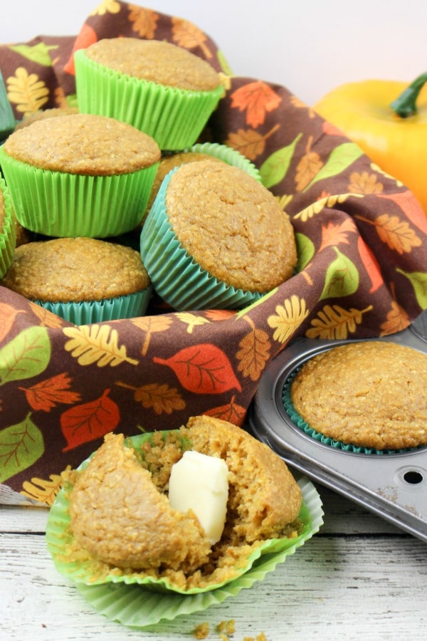 Pumpkin Spice Cornbread Muffins- baked muffins with butter
