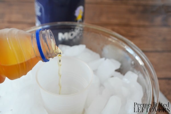 Making Slush Science Activity- pour juice in cup