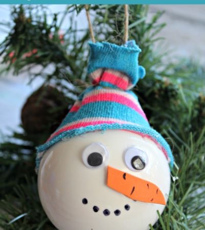 This Snowman Christmas Ornament craft is a fun and simple way for kids to decorate the tree. It is also a sweet, homemade gift for friends and relatives.