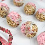 These festive White Chocolate Dipped Oatmeal & Fruit Balls are sprinkled with crushed candy cane. Make this easy recipe and spread the holiday cheer!