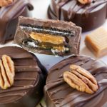 These Turtle Candy Chocolate Dipped Oreo Cookies are an easy treat everyone will enjoy! They combine Oreos with decadent caramel, chocolate, and pecans.