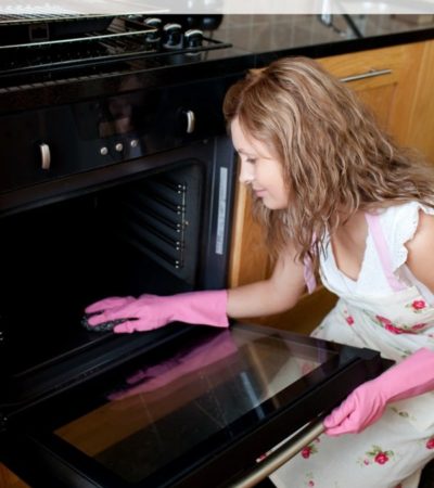 This guide to how to clean your oven offers step by step instructions for using both store bought cleaners and a natural DIY method.