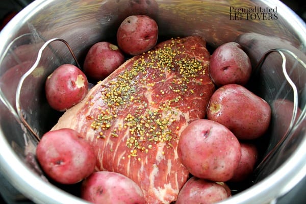 Add potatoes to the corned beef in the Instant Pot