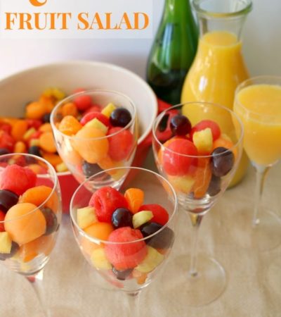Mimosa Fruit Salad recipe served in wine glasses.