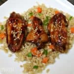 Sous Vide Honey Garlic Chicken Wings Recipe served on cauliflower fried rice.