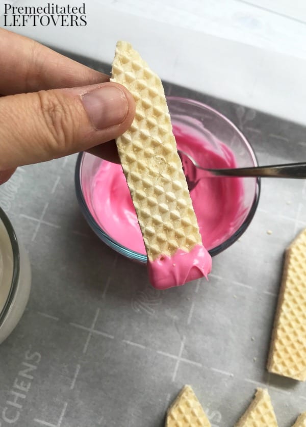 Dip wafer in pink chocolate to make eraser