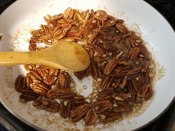 saute candied pecans in pan