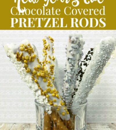 New Years White Chocolate dipped pretzel rods with silver and gold sprinkles