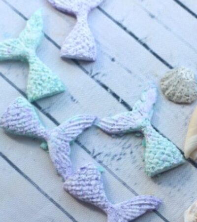 Use this homemade mermaid bath bomb recipe to make these fun mini mermaid tail bath bombs. Add essential oils & natural colors to create custom bath bombs.