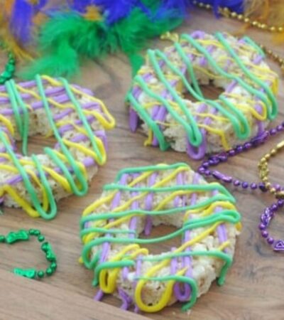 This King Cake Rice Krispie Treats Recipe gives your Mardi Gras party a sweet kick!