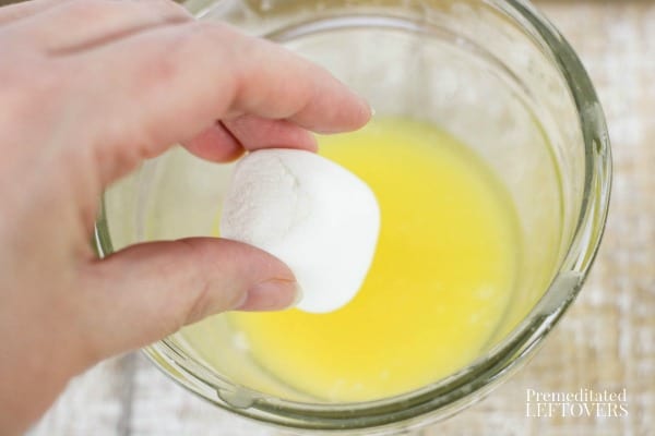 dip marshmallow in melted butter to make resurrection rolls