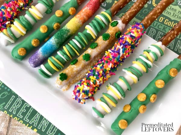 rainbow and green pretzel rods on a plate