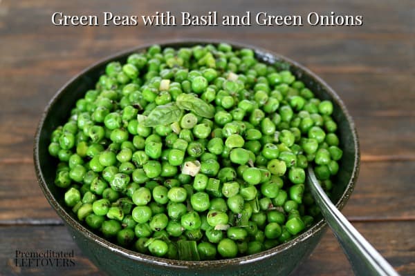 Peas with basil in a serving bowl.