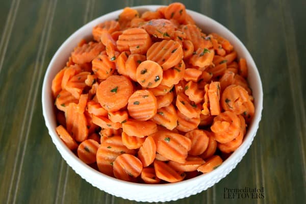 Quick and easy glazed carrots recipe in white bowl.