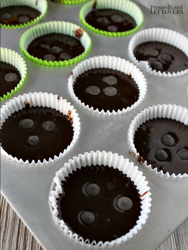 Grain-free chocolate muffin batter in muffin tins.