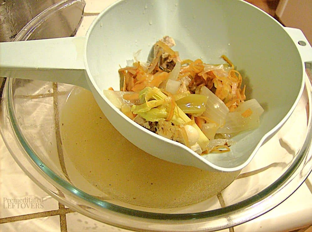 straining broth after making broth in slow cooker