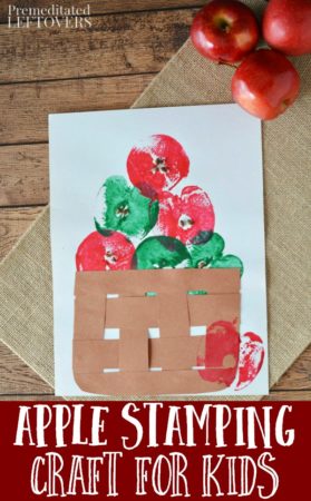 apple stamping craft for kids on white paper with a woven paper basket