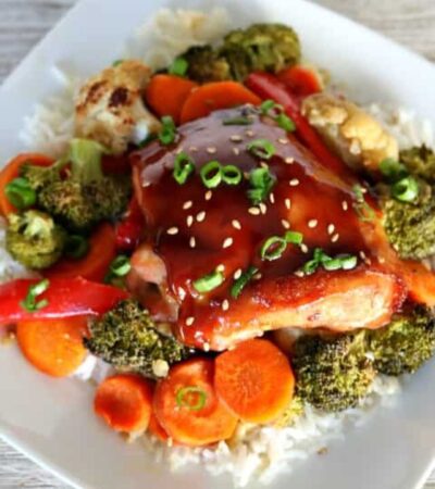 Quick and easy sheet pan Mongolian chicken recipe with vegetables served over rice.