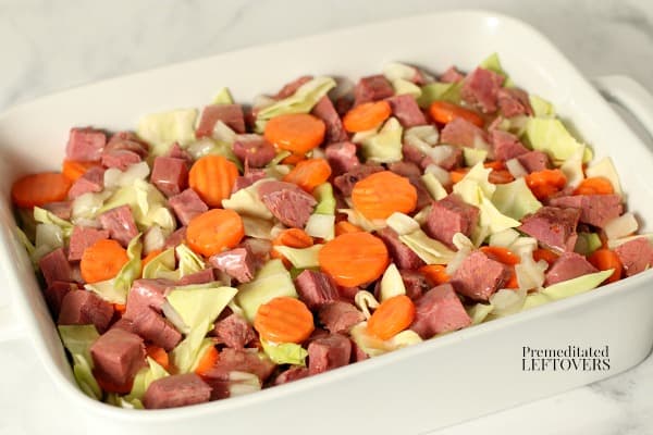 Drizzle the gravy over the corned beef and vegetables.