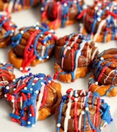 a serving dish with patriotic Rolo pretzel turtles on it