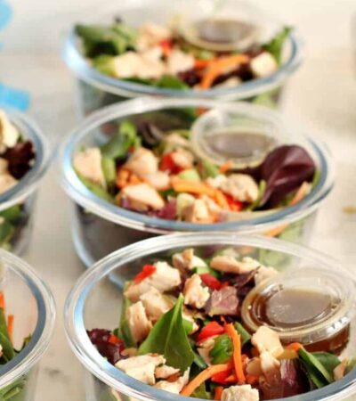 5 meal prep Asian chicken salads in glass containers