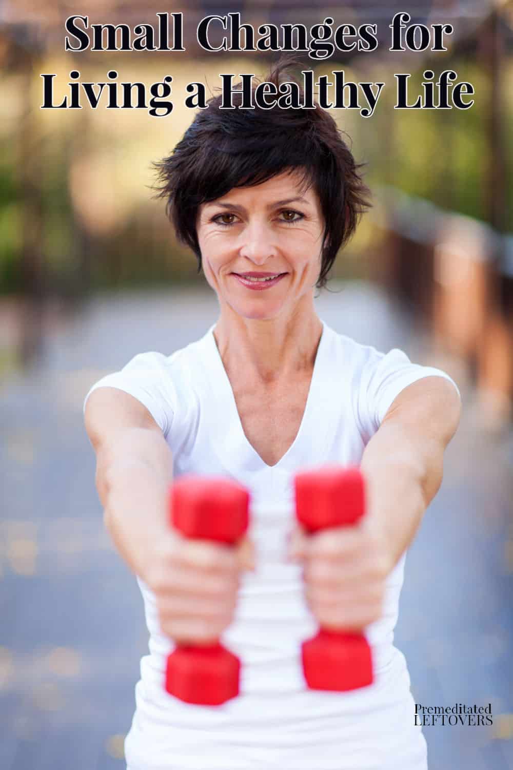 a woman exercising with dumbbells