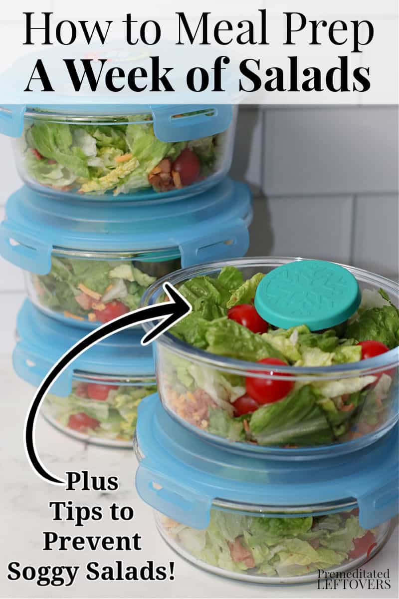 5 meal prep salads in containers with dressing in a separate container to prevent soggy salads