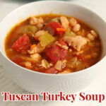 tuscan turkey soup recipe made with leftover turkey and Italian spice in a white bowl